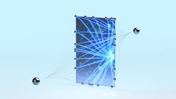A 3D rendering of a translucent glass panel resembling a circuit board, with glowing blue lines representing data streams. Multiple metallic spheres are connected to the panel by thin lines, visually illustrating a network or interconnected system.